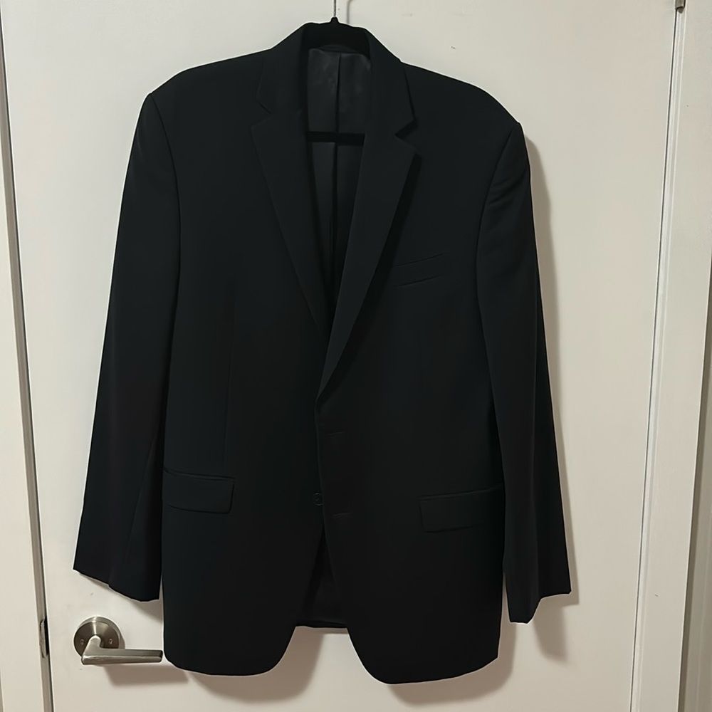 Calvin Klein size 42 suit jacket only (no pants to match). Dark Navy 100% wool
